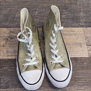 Gold Sparkly Converse High Tops.